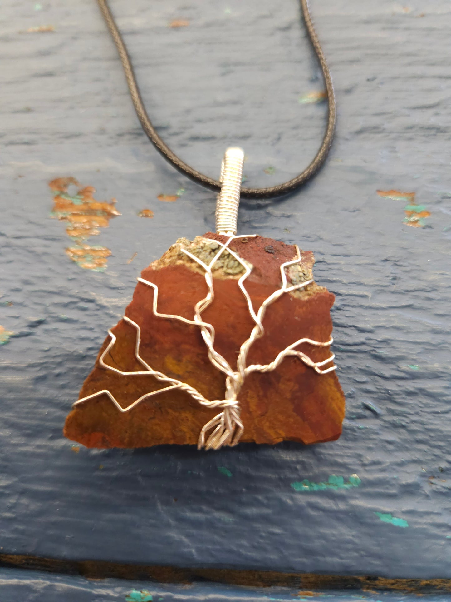 Silver Tree of Life on Red Stone